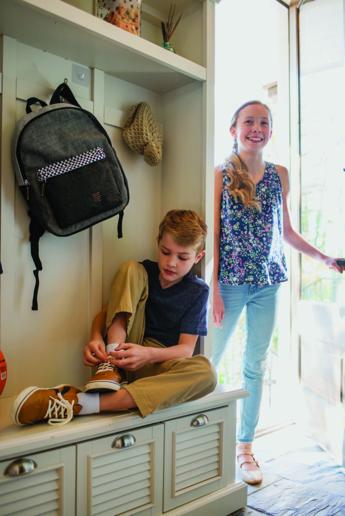 boy_tying_shoe_with_sisterr